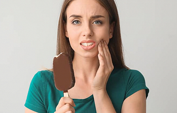 Чувствительность зубов: причины и лечение